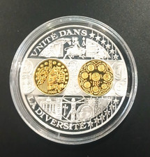 Médaille argent/or -  1er