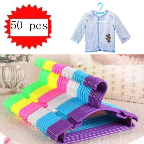 Lot cintres bébé - 50,