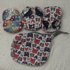 3 bumgenius cloth diapers with