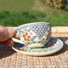 Antique coffee / tea cup + saucer / enamels from Thun (Switzerland)