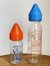 Set of 2 Antique Glass Bottles - Remond - 70's - Orange