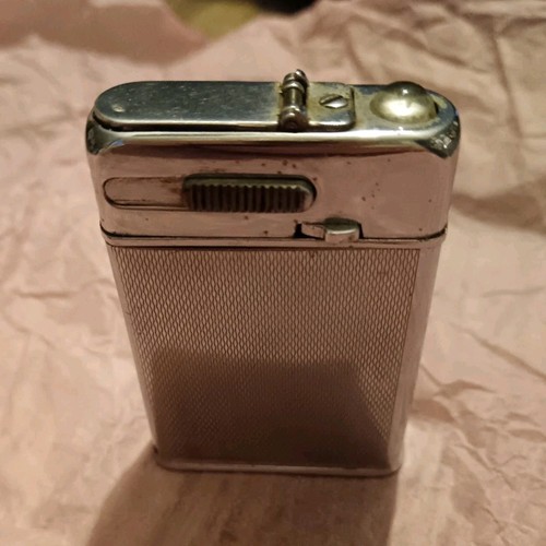 Briquet essence - à,