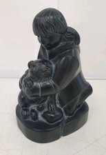 sculpture fille inuit husky