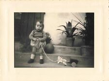 OLD NICE BLACK AND WHITE PHOTO GIRL WOODEN TOY ON ROULETTE 1952