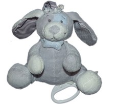 Doudou peluche musicale chien