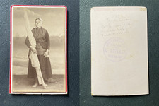 Deplace, Berck-sur-Mer, woman in traditional costume holding a boat sail