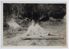 Woman lying side air mattress grass - vintage photo snapshot