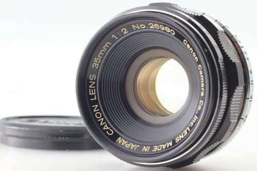 Comme neuf objectif grand - objectif,
