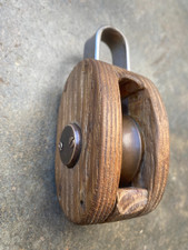 Ancienne  poulie en laiton et