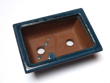 Pot en terre recouvert de