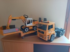 BRUDER 1/16 CAMION MAN PORTE ENGINS AVEC PELLETEUSE LIEBHERR SANS B/TE