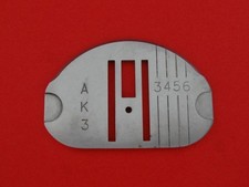 Plaque à aiguille Singer