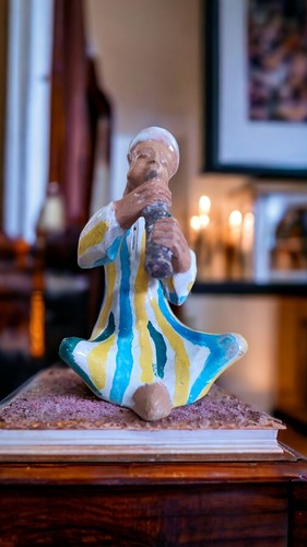 Statuette musicien flûte