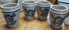 four Small pottery containers grey with blue decoration