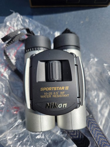 Paire jumelles nikon - de,