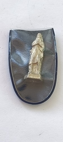 Antique old metal figurine