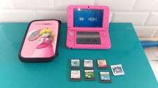 console jeu vidéo VF Nintendo 3DS XL rose avec lot de jeux et pochette peach