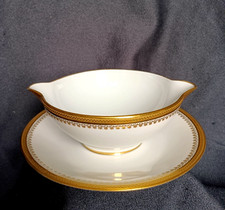 Saucière en porcelaine de Limoges blanc frise dorure