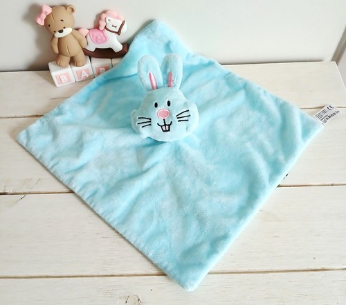 Action doudou peluche lapin