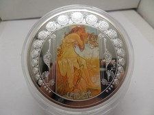 Médaille, Mucha, Les quatre