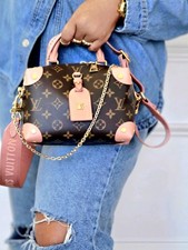 LOUIS VUITTON PETITE MALLE