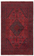 Tapis oriental afghan noué à