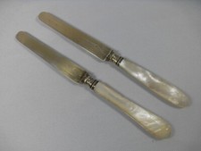 2 fruit/entremet knives, vermeil blades, mother-of-pearl handles, Minerva hallmark