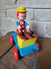 ANCIEN JOUET BOIS À TIRER CLOWN JOUE DU XYLOPHONE 