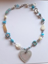 Beau collier pendentif coeur