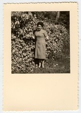 Portrait Woman Standing in Front of Bushes Hedge Shrubs - Old Photo Year. 1950
