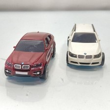Two BMW pullback miniature cars (:OKU10199/A3-60)