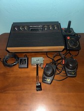 Atari 2600 Console w/ 2 Paddles & 2 Joysticks