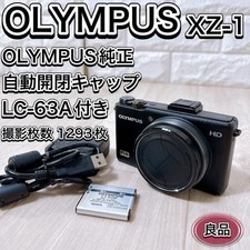 Appareil photo numérique noir OLYMPUS XZ-1 avec bouchon d'objectif ouvert/fer...