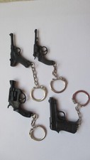 4 porte clés pistolet