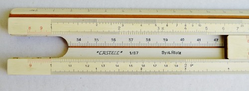 Règle calcul a - →, a.