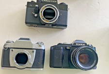 3 VINTAGE FILM CAMERAS PRAKTICA, EXA IIA , KONICA FS-1 W/ 52MM 1.8 LENS (AS IS)
