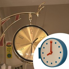 Horloge murale d'angle