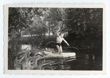 Men having fun boat river canoe swimsuit - old photo snapshot