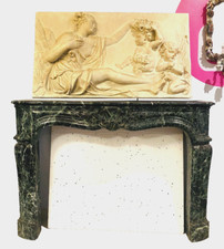 cheminée Louis XV en marbre vert de mer jambages galbée . XIX siècle .
