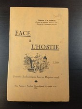 FACE à L'HOSTIE | L.-E