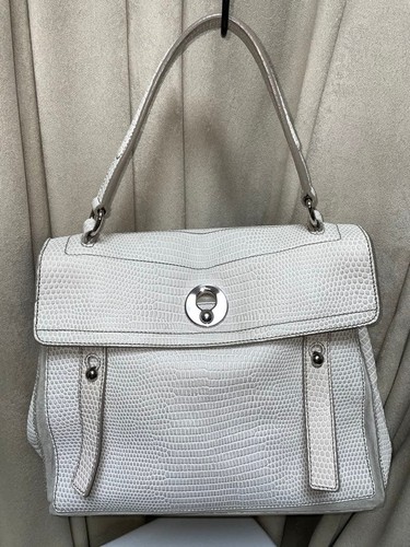 Deux sacs main - main, ysl