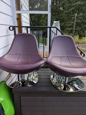 Pair of vintage IKEA Tirup leather swivel egg chairs Mid-century modern style