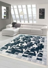 Patchwork de tapis en peau imitation de vache noir gris blanc