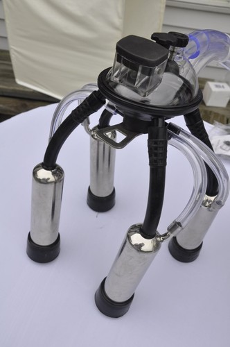 Cow milking machine milker - cow,