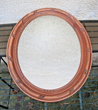 miroir ovale en bois sculpté