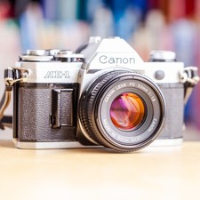 Canon AE-1 + Canon 50mm f/1.8 FD + Filtre + Pile Neuve AE1 !! Super Offre !!