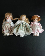 3 mini  poupées en porcelaine