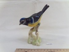 Ancien oiseau en porcelaine