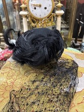 old women's fashion hat circa 1940 veil and feathers