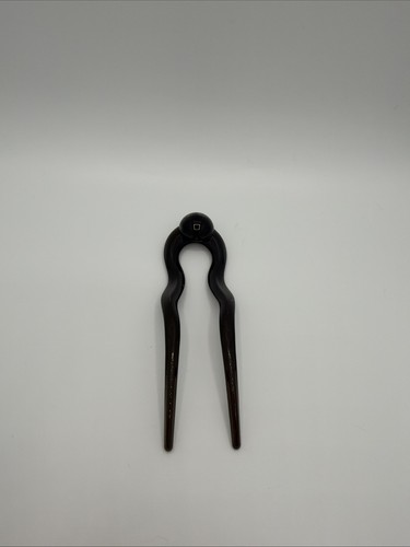 Pince cheveux noire pic à - À,